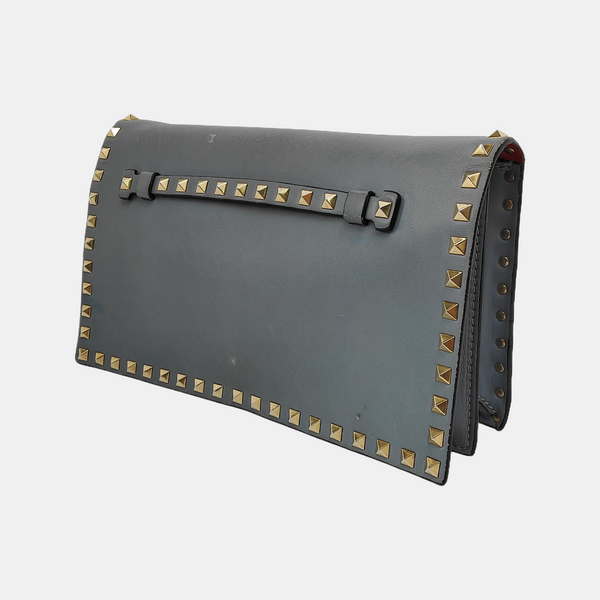 Authenticated pre-owned Rockstud Calfskin Blue - Clutch at Looply