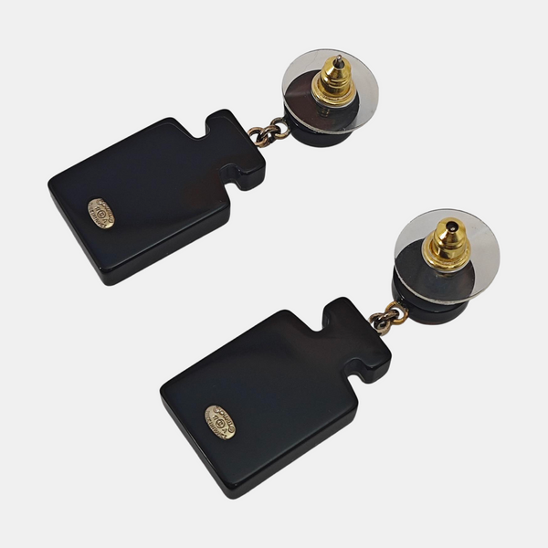 Pendientes de botón negros de material sintético