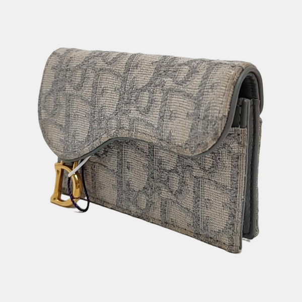 Authenticated pre-owned Saddle Oblique Canvas Gray Wallet - Wallet at Looply