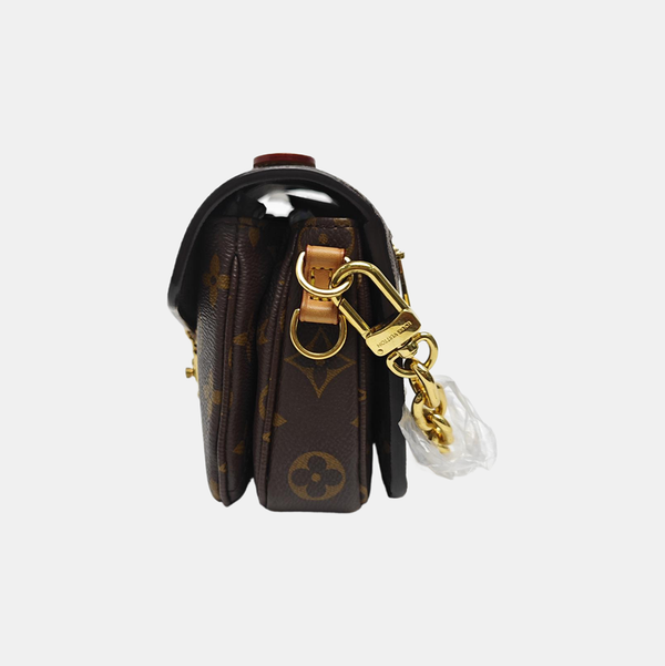MÉTIS EAST WEST Monogram Coated Canvas Brown