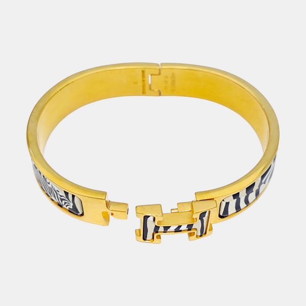 Authenticated pre-owned Clic H Metal Gold Plated Enamel Gold Bracelet - Bracelet at Looply
