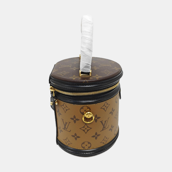 CANNES PM Monogram Coated Canvas Brown