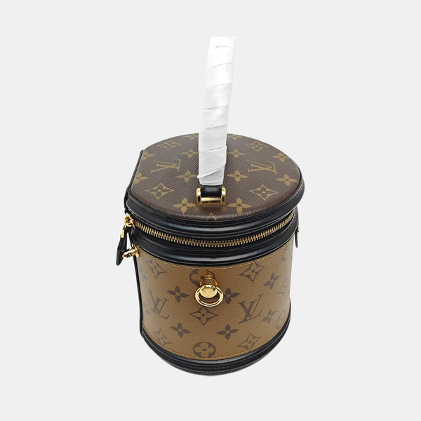 CANNES PM Monogram Coated Canvas Brown