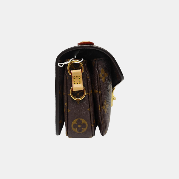 MÉTIS EAST WEST Monogram Coated Canvas Brown