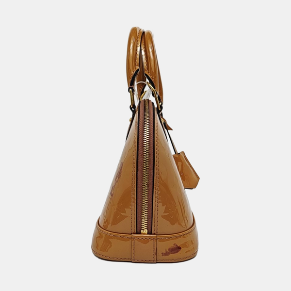 Authenticated pre-owned ALMA Monogram Patent Leather Yellow - Shoulder Bag at Looply