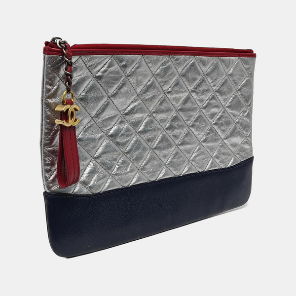 Authenticated pre-owned GABRIELLE Calfskin Silver - Clutch at Looply