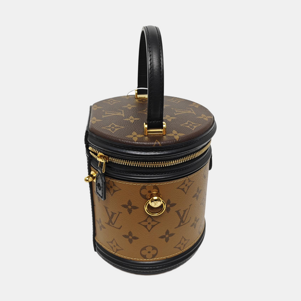 CANNES PM Monogram Coated Canvas Brown