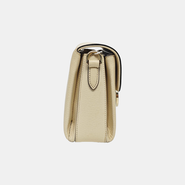 Piel de becerro mini con G entrelazada Beige