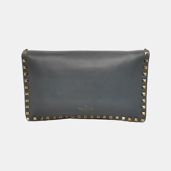 Authenticated pre-owned Rockstud Calfskin Blue - Clutch at Looply