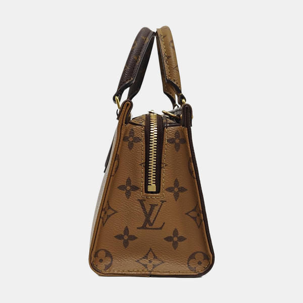 ONTHEGO EAST WEST PM Monogram Coated Canvas Brown
