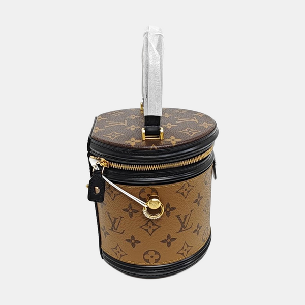 CANNES PM Monogram Coated Canvas Brown