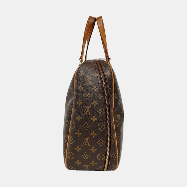 EXCURSION Monogram Coated Canvas Brown