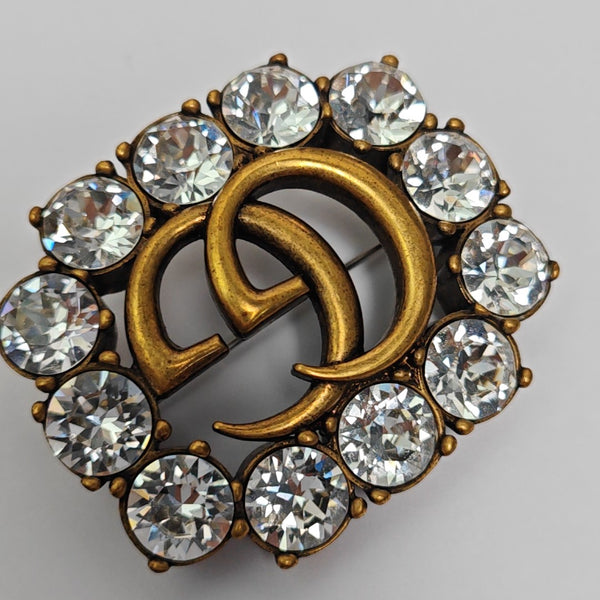 GG Running Metal Gold Brooch
