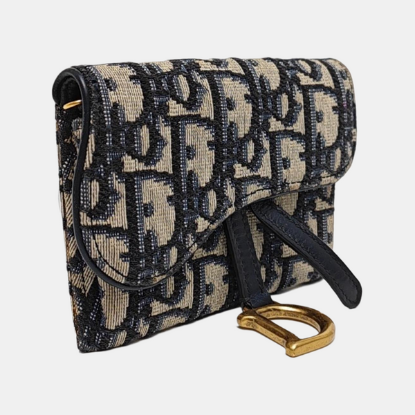 Authenticated pre-owned Saddle Oblique Canvas Blue - Clutch at Looply