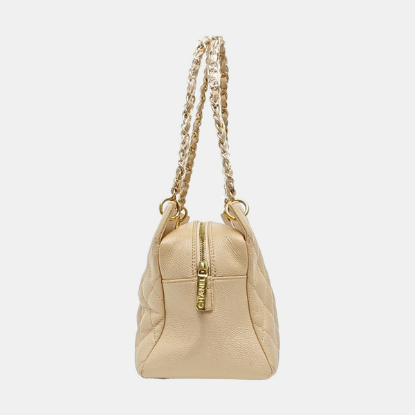 CHANEL PETITE Piel de becerro graneada acolchada beige