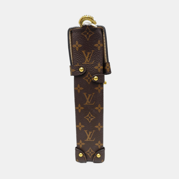 TRUNK Monogram Coated Canvas Brown