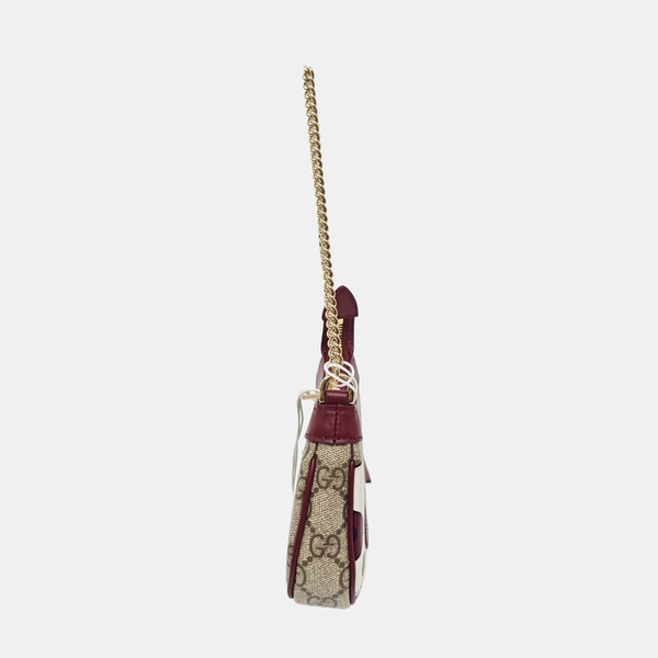 Minibolso de tela monograma marrón