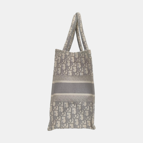 Authenticated pre-owned Book Tote Medium Oblique Canvas White - Tote Bag at Looply