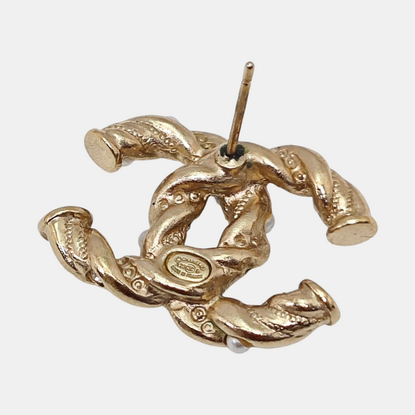 Pendientes de metal dorado