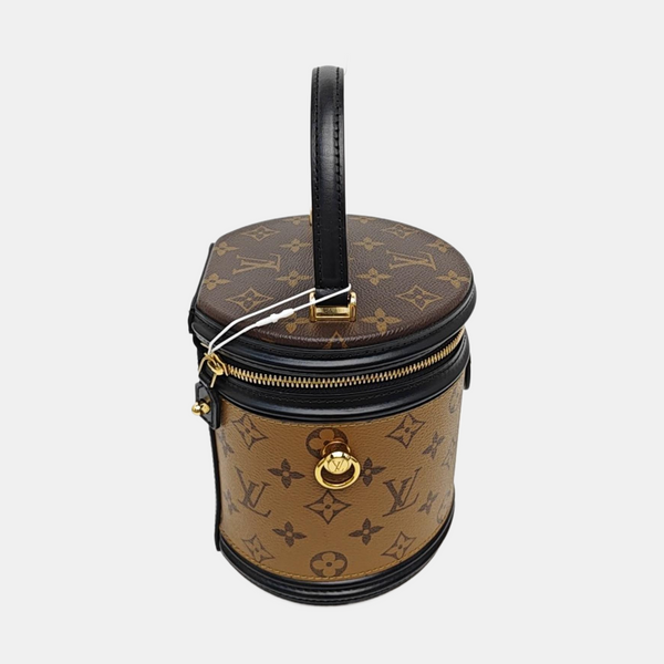CANNES PM Monogram Coated Canvas Brown