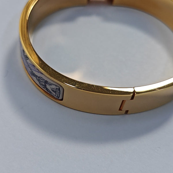 Brazalete Clic H de oro rosa