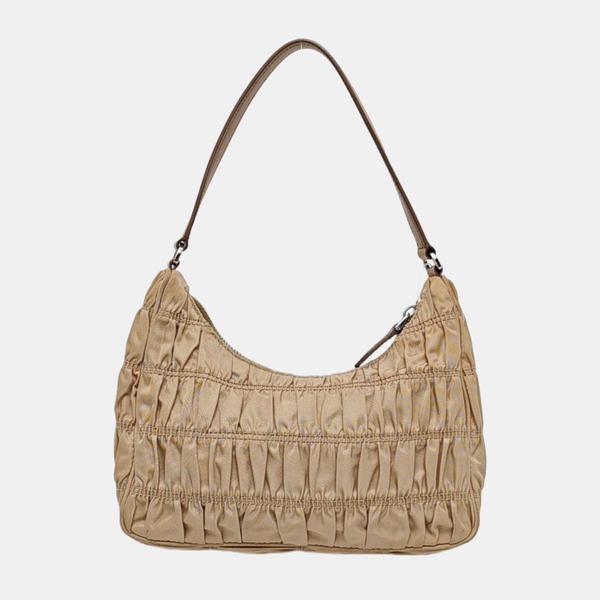 Authenticated pre-owned Re-Edition2005 Mini Quilted Nylon Beige - Top Handle Bag at Looply