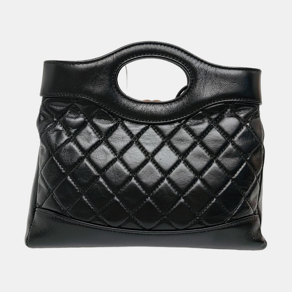 CHANEL 31 Mini Piel de cordero acolchada negra