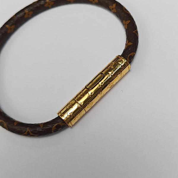 CONFIDENTIEL Metal Brown Bangle