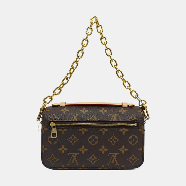 MÉTIS EAST WEST Monogram Coated Canvas Brown