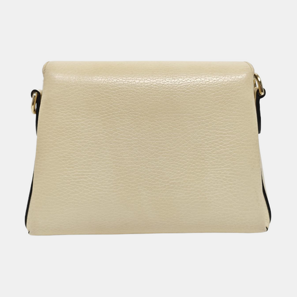 Piel de becerro mini con G entrelazada Beige