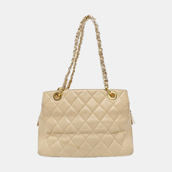 CHANEL PETITE Piel de becerro graneada acolchada beige