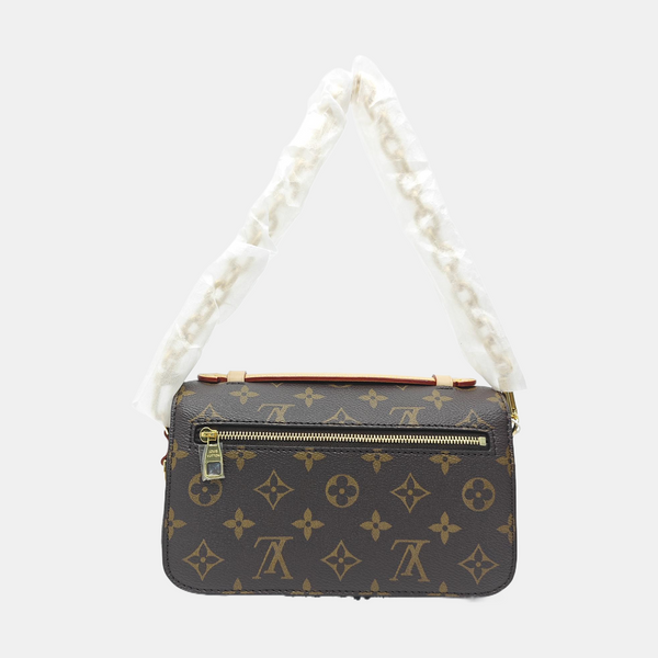 MÉTIS EAST WEST Monogram Coated Canvas Brown
