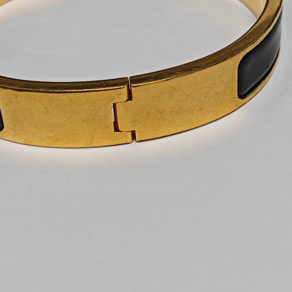 Pulsera Clic H Metal Oro