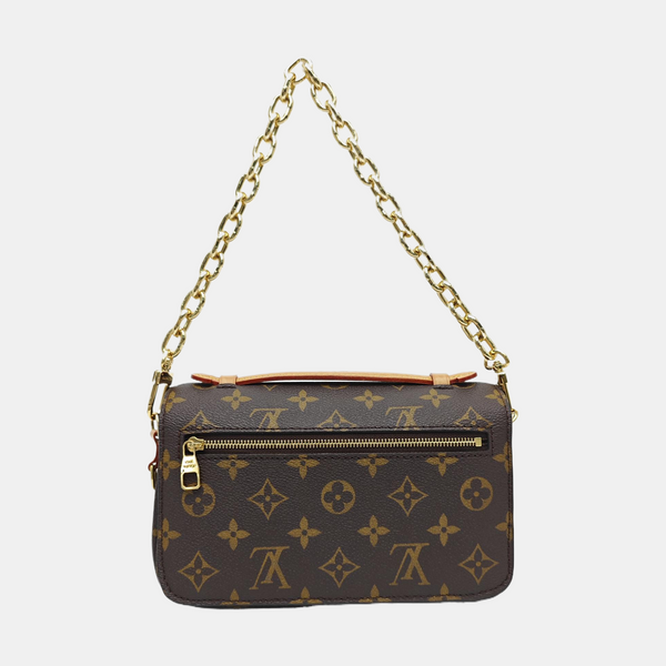 MÉTIS EAST WEST Monogram Coated Canvas Brown