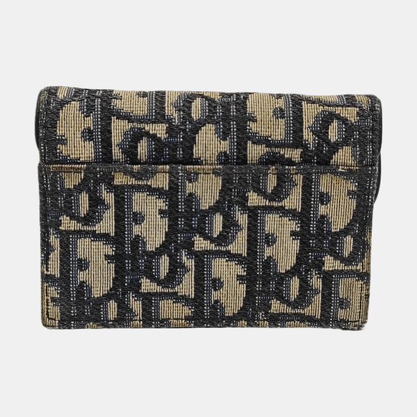 Authenticated pre-owned Saddle Monogram Canvas Blue Card Holder - Card Holder at Looply
