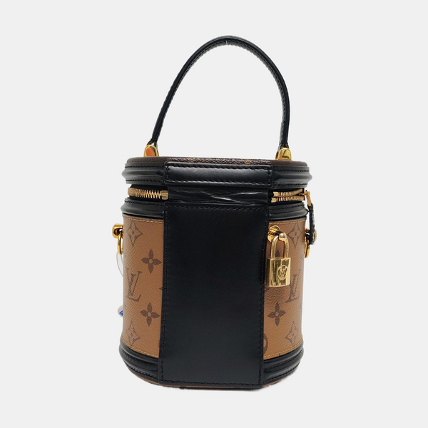 CANNES PM Monogram Coated Canvas Brown