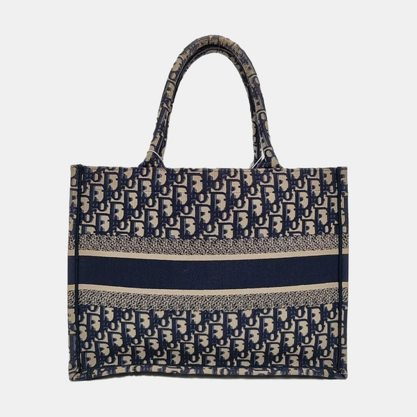 Authenticated pre-owned Book Tote Medium Monogram Canvas Blue - Tote Bag at Looply