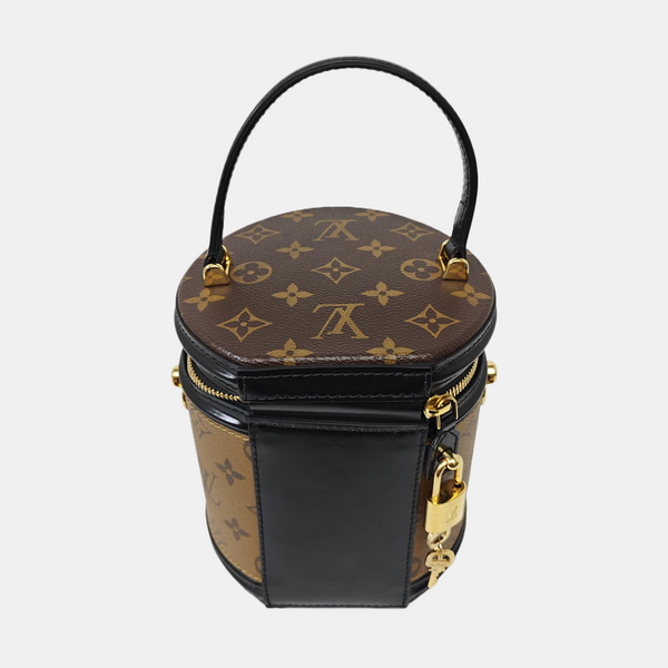 CANNES PM Monogram Coated Canvas Brown