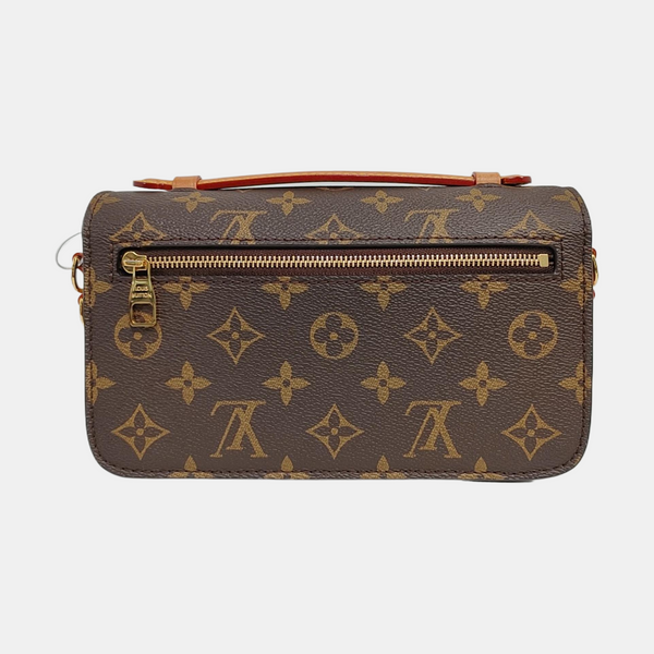 MÉTIS EAST WEST Monogram Coated Canvas Brown