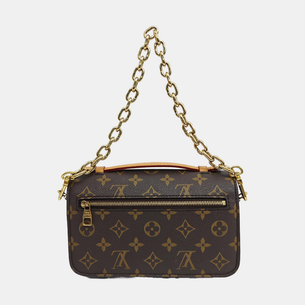 MÉTIS EAST WEST Monogram Coated Canvas Brown