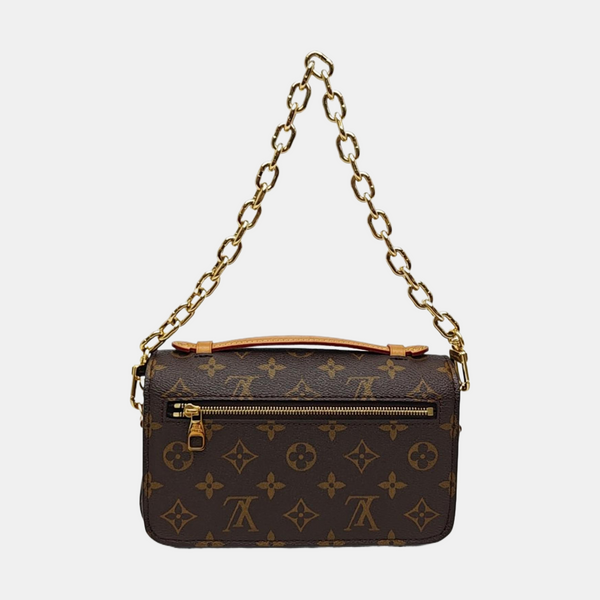 MÉTIS EAST WEST Monogram Coated Canvas Brown