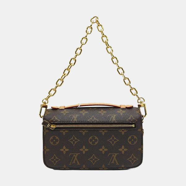MÉTIS EAST WEST Monogram Coated Canvas Brown