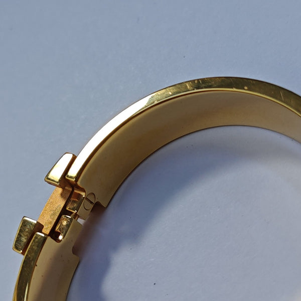 Brazalete Clic H de oro rosa