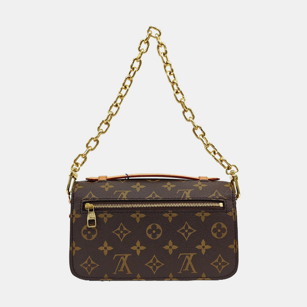 MÉTIS EAST WEST Monogram Coated Canvas Brown