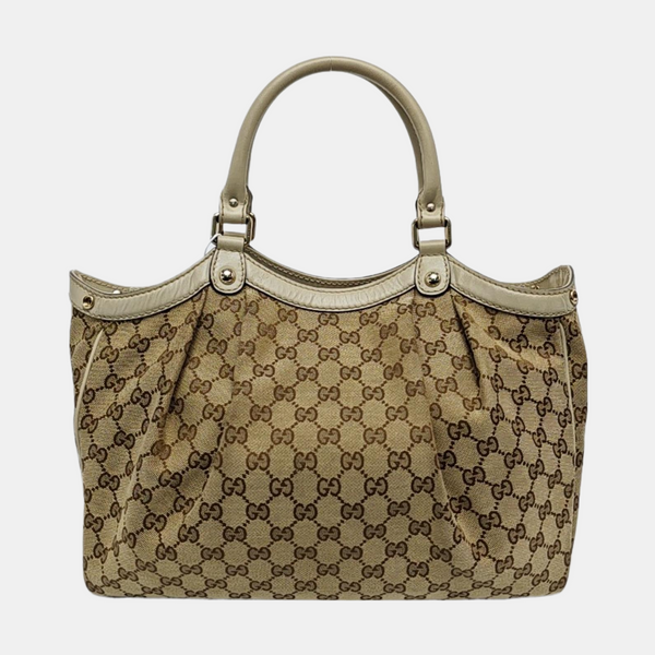 Authenticated pre-owned Sukey Monogram Canvas Beige - Top Handle Bag at Looply
