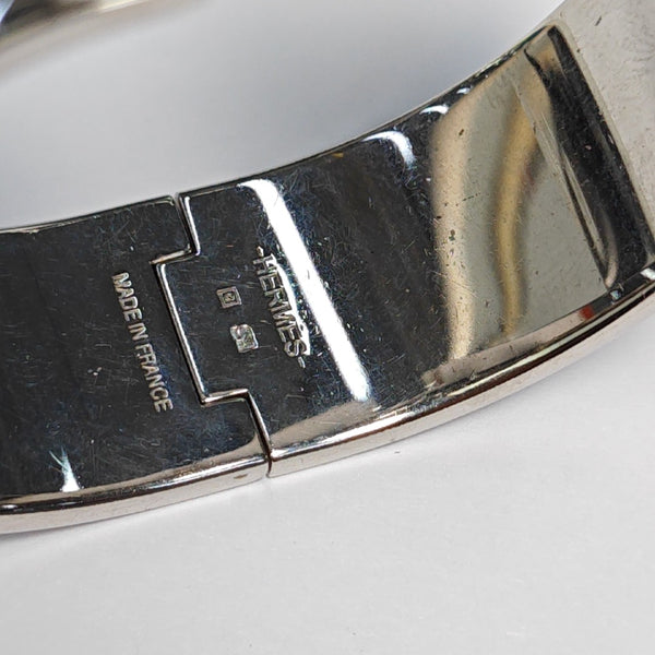 Brazalete Clic Clac H de metal plateado