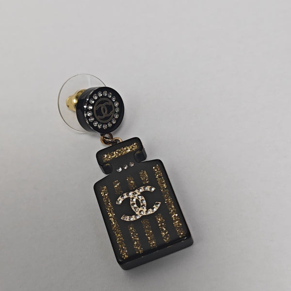 Pendientes de botón negros de material sintético