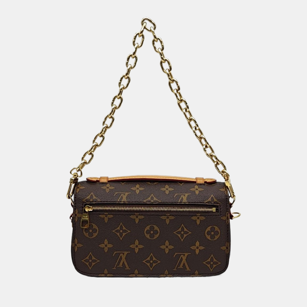 MÉTIS EAST WEST Monogram Coated Canvas Brown
