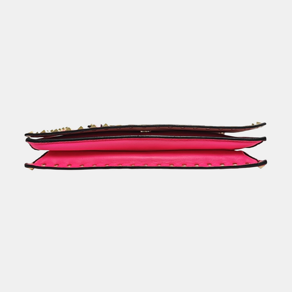 Authenticated pre-owned Rockstud Lambskin Pink - Clutch at Looply
