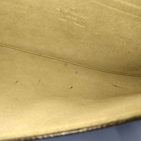 TWIN GM Monogram Coated Canvas Brown